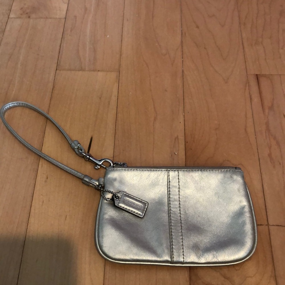 Coach brand leather silver metallic wristlet